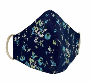 This flowered plastic-free reusable cotton face mask comes with a nose bridge and ear loops for a tight fit.